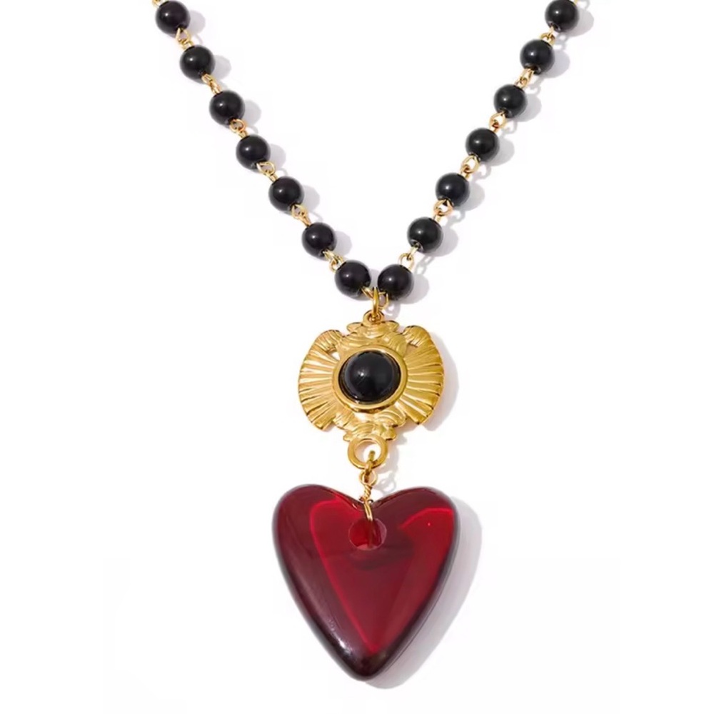 Sara Sotti Gold and Black Heart Pendant Necklace